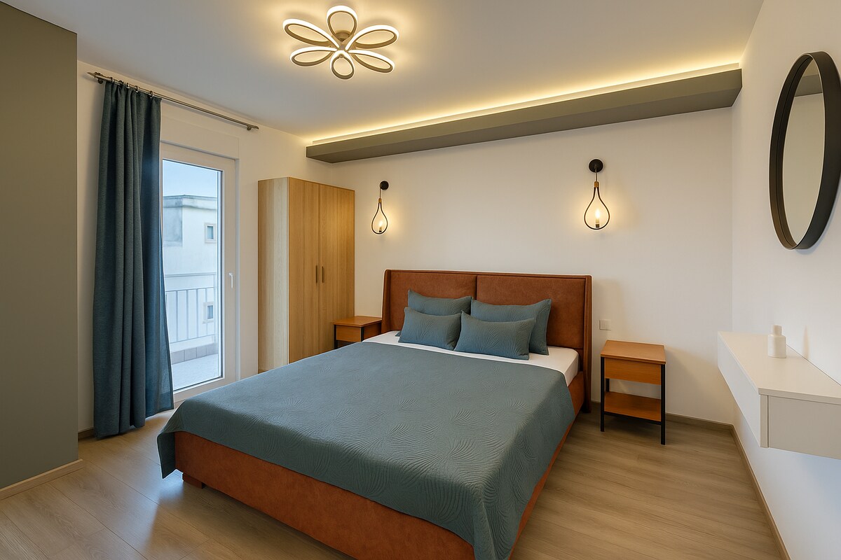 Deluxe Double Room bedroom with modern lighting